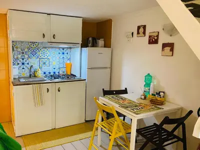 Cucina o angolo cottura di I Rifugi Blu e Sole di Neapolis Teatro Antico