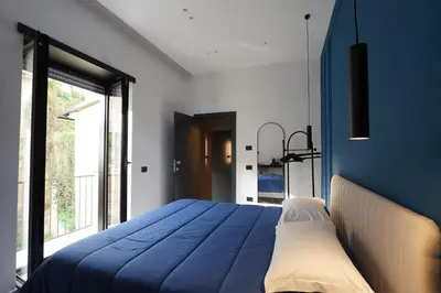 Letto o letti in una camera di Myto Relais