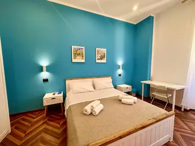 Letto o letti in una camera di Giano's Rooms