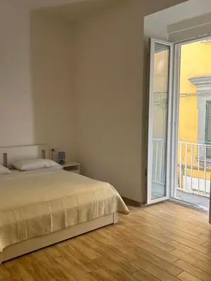 Letto o letti in una camera di Napoli centro le Suite di Giordy e Peppe