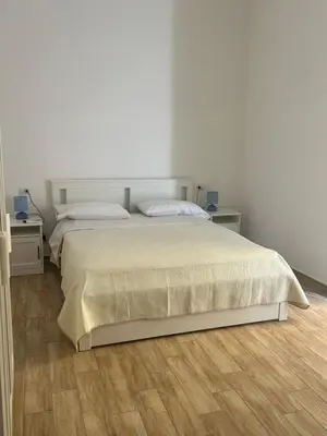Letto o letti in una camera di Napoli centro le Suite di Giordy e Peppe