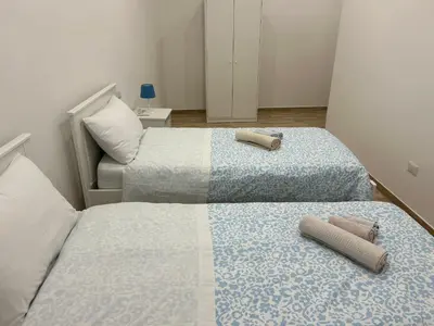 Letto o letti in una camera di Napoli centro le Suite di Giordy e Peppe