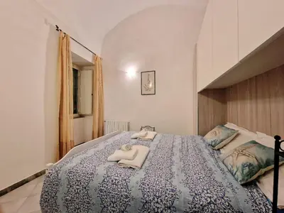 Letto o letti in una camera di Parthenope's House