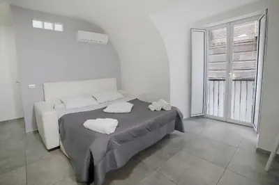 Letto o letti in una camera di Casa Sant Anna