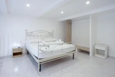 Letto o letti in una camera di Casa Atri Spaccanapoli Centro storico