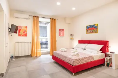 Letto o letti in una camera di Le Voci del Centro By DomusExtra