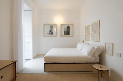 Letto o letti in una camera di Cupola Reale