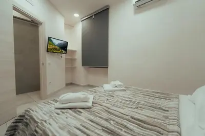 Letto o letti in una camera di Dimora311