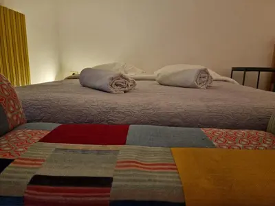 Letto o letti in una camera di Napoli Connect Guesthouse