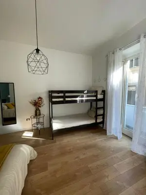 Letto o letti in una camera di La città di Pulcinella