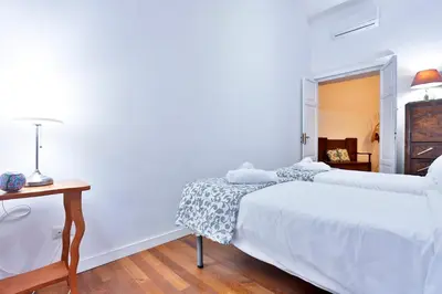 Letto o letti in una camera di GuestHost - Residenza Mura Greche Historic Center
