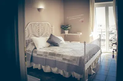 Letto o letti in una camera di La Peonia