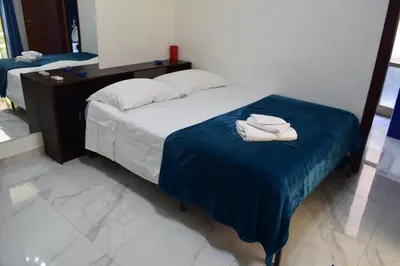 Letto o letti in una camera di Casa Artemisia