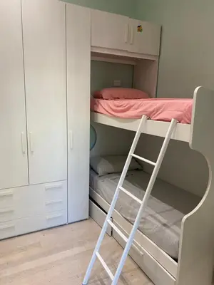 Letto o letti a castello in una camera di Casa morelli lux
