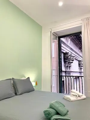Letto o letti in una camera di B&B Dimora Cortese