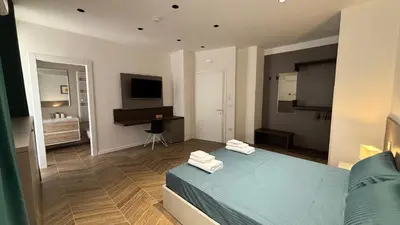 Letto o letti in una camera di Seaside Suites