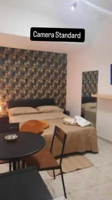 Letto o letti in una camera di Casa suite del cardinale 2