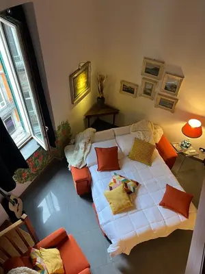 Letto o letti in una camera di Ann' Amarì Arancione