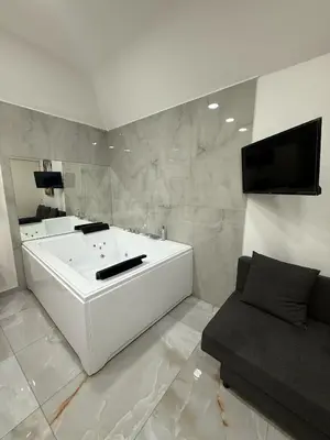 TV o dispositivi per l'intrattenimento presso Valentino Suite 36