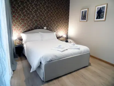 Letto o letti in una camera di The Double Charme