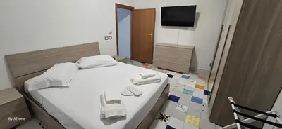 Letto o letti in una camera di Appartamenti La Dimora di Parthenope Centro Storico