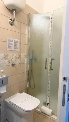 Bagno di House Corso Umberto Rooms & Comfort by Loveinthetravel