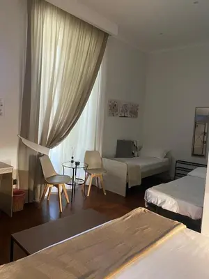 Letto o letti in una camera di AR b&b Nel Cuore di Napoli