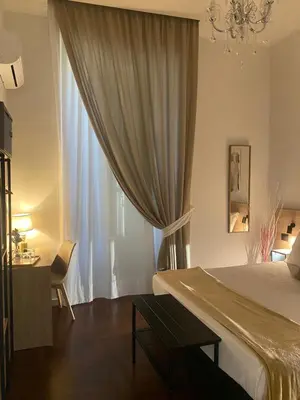 Letto o letti in una camera di AR b&b Nel Cuore di Napoli