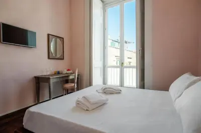 Letto o letti in una camera di Carafa Palace By Dimorra