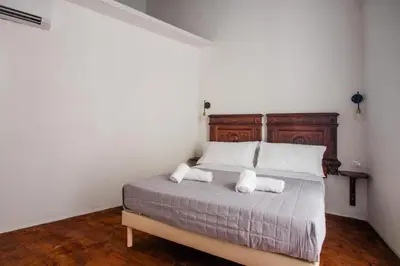 Letto o letti in una camera di Carafa Palace By Dimorra
