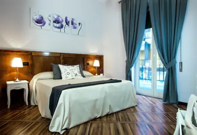 Letto o letti in una camera di Your Bed Napoli