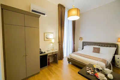 Letto o letti in una camera di NapoliclassTerrace
