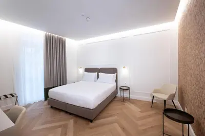 Letto o letti in una camera di Casa D Hotel Napoli