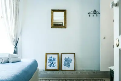 Letto o letti in una camera di Le suite Vomero