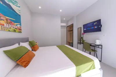 Letto o letti in una camera di The Ease