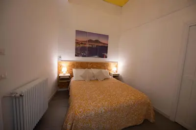 Letto o letti in una camera di Resta Cu'mme Vomero