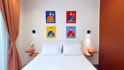 Letto o letti in una camera di Michelangelo 48