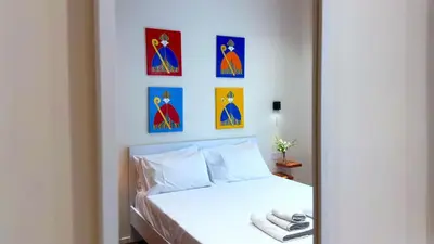 Letto o letti in una camera di Michelangelo 48