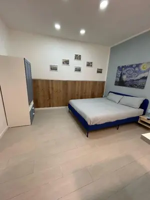 Letto o letti in una camera di Zia Pina