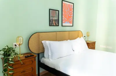 Letto o letti in una camera di Santanotte Apartment