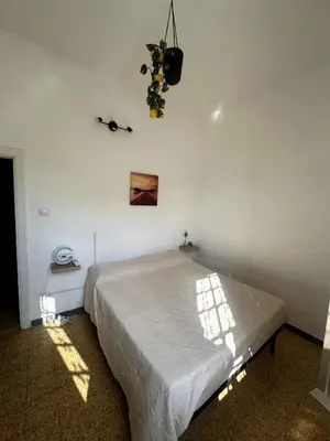 Letto o letti in una camera di Elena's House