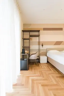 Letto o letti in una camera di Una finestra sul Madre By Dimorra