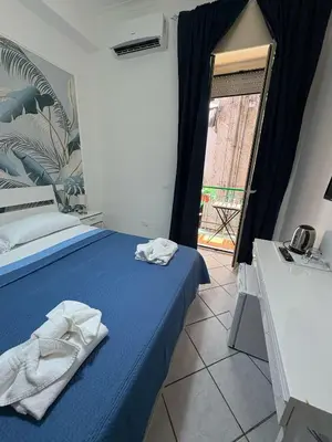 Letto o letti in una camera di ViRen Rooms