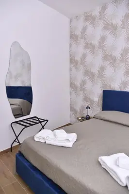 Letto o letti in una camera di Rivieras House - Central Suites Naples
