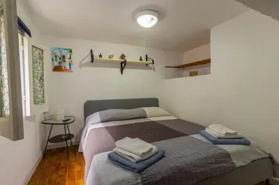 Letto o letti in una camera di A' casarell' e Lell'