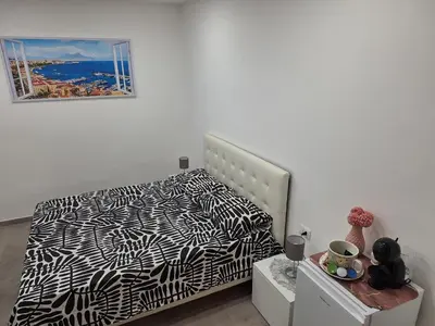 Letto o letti in una camera di Affittacamere Al centro