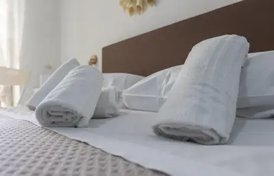Letto o letti in una camera di Relais Borbonico Chiaia