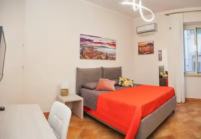Letto o letti in una camera di Domus Bovio - Nel cuore di Napoli
