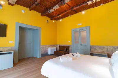 Letto o letti in una camera di Il Disinganno - Elegant Historic Residence in the center