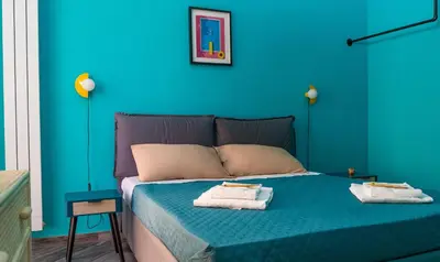 Letto o letti in una camera di B&B MilleCulure